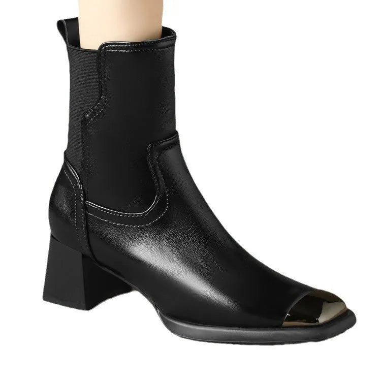 Brown women's cowhide Martin ankle boots with a high heel and side zipper on a white background.