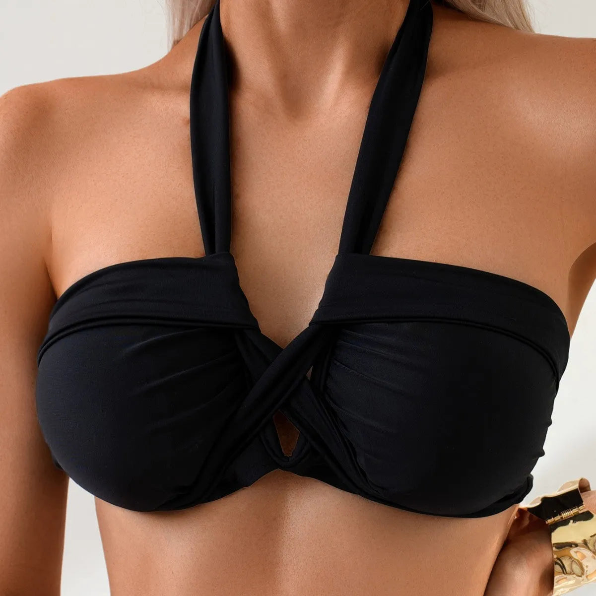 Black women's backless one-piece swimming costume with briefs style on mannequin