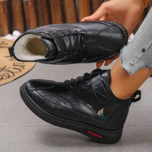 Women's black velvet slip-on shoes with rubber sole and low-cut design