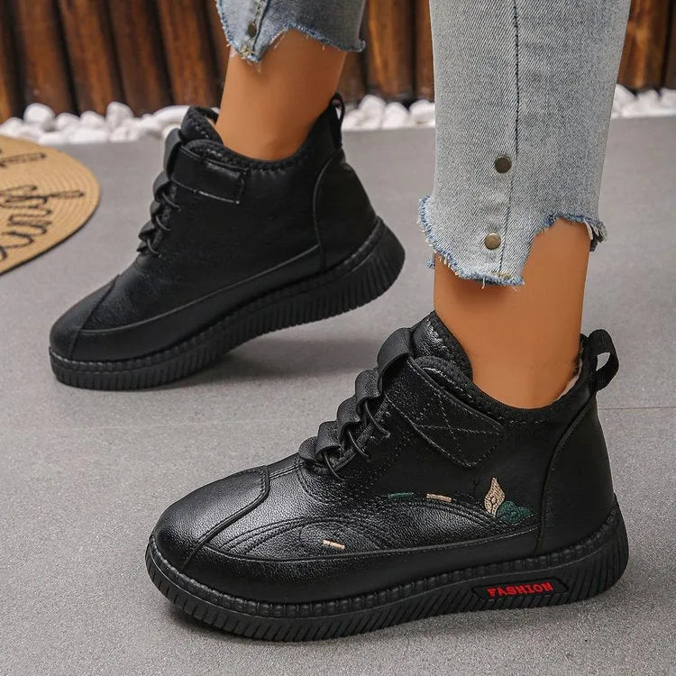 Women's black velvet slip-on shoes with rubber sole and low-cut design