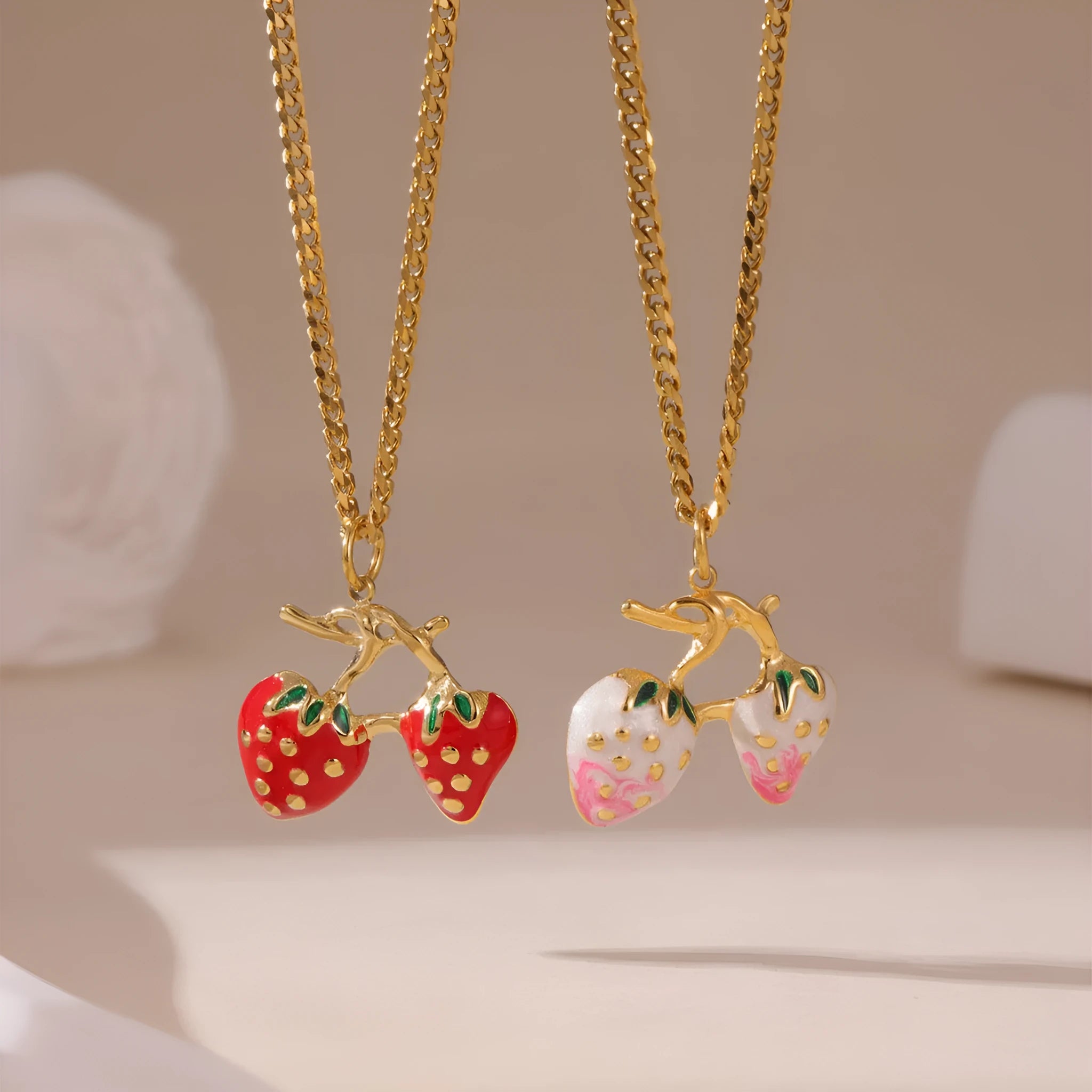 Stainless steel strawberry fruit pendant necklace for women in white gradient or red colour on alloy chain