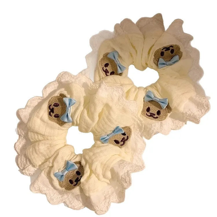 Bear blue bow lace large intestine hair ring on white background
