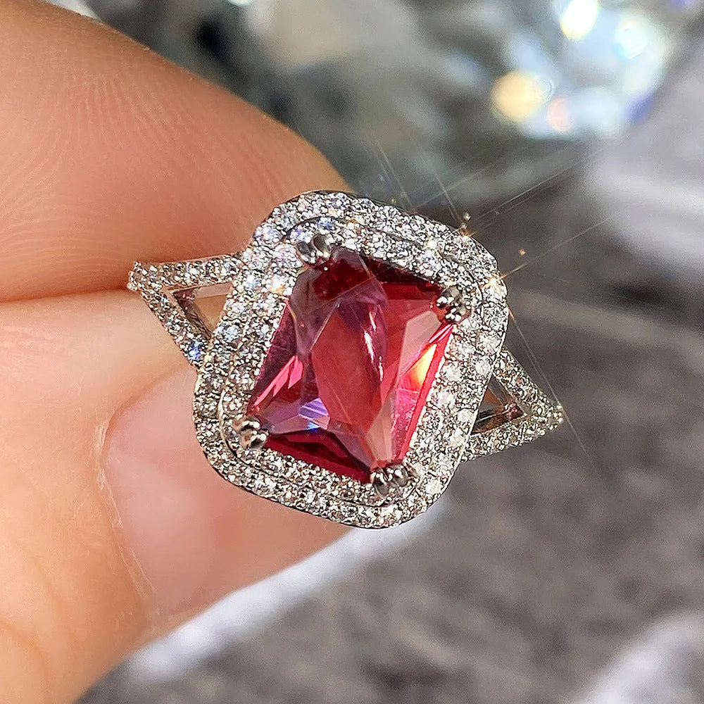 Women's copper square ring with red finish and princess-cut rhinestones on geometric band