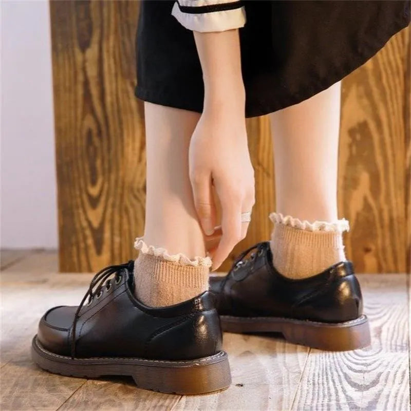 Women's black retro Mary Jane shoes with front lace-up and low square heel