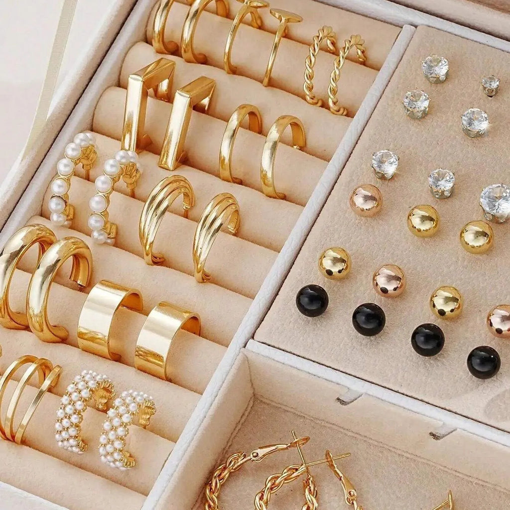 108 geometric pearl earrings with round elements in gold and yellow electroplated alloy