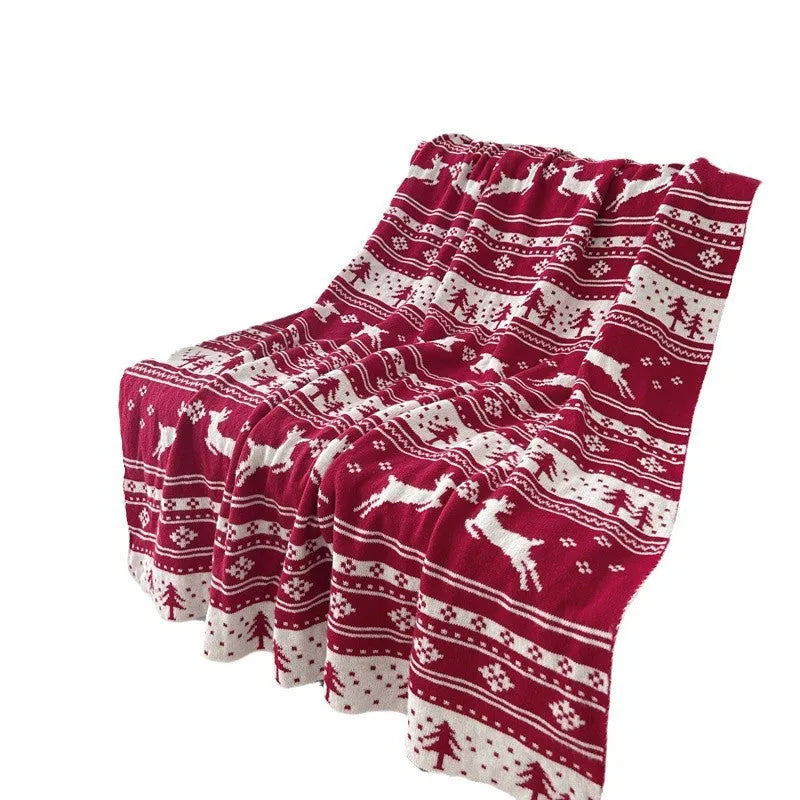 Personalised Christmas blanket with festive snowflake or reindeer pattern in acrylic fabric