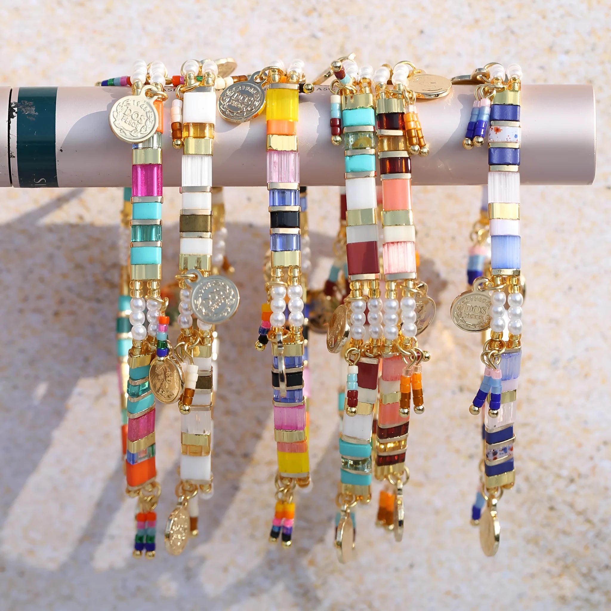 Women's imitation pearl beaded bracelet with glass coloured beads in six pearl lifting colour options