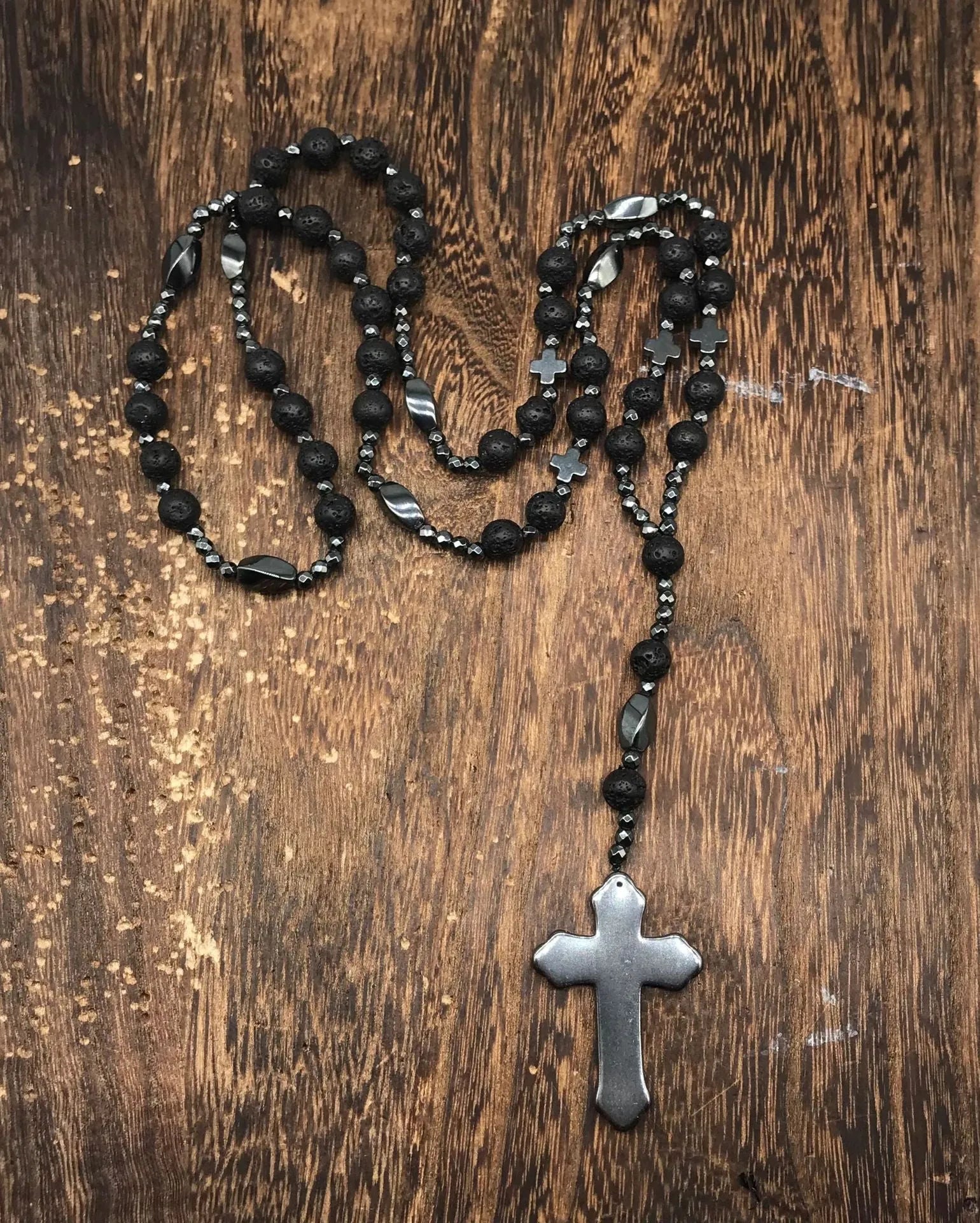 Men's stone cross pendant necklace on a ball bead chain with a safety lock clasp.