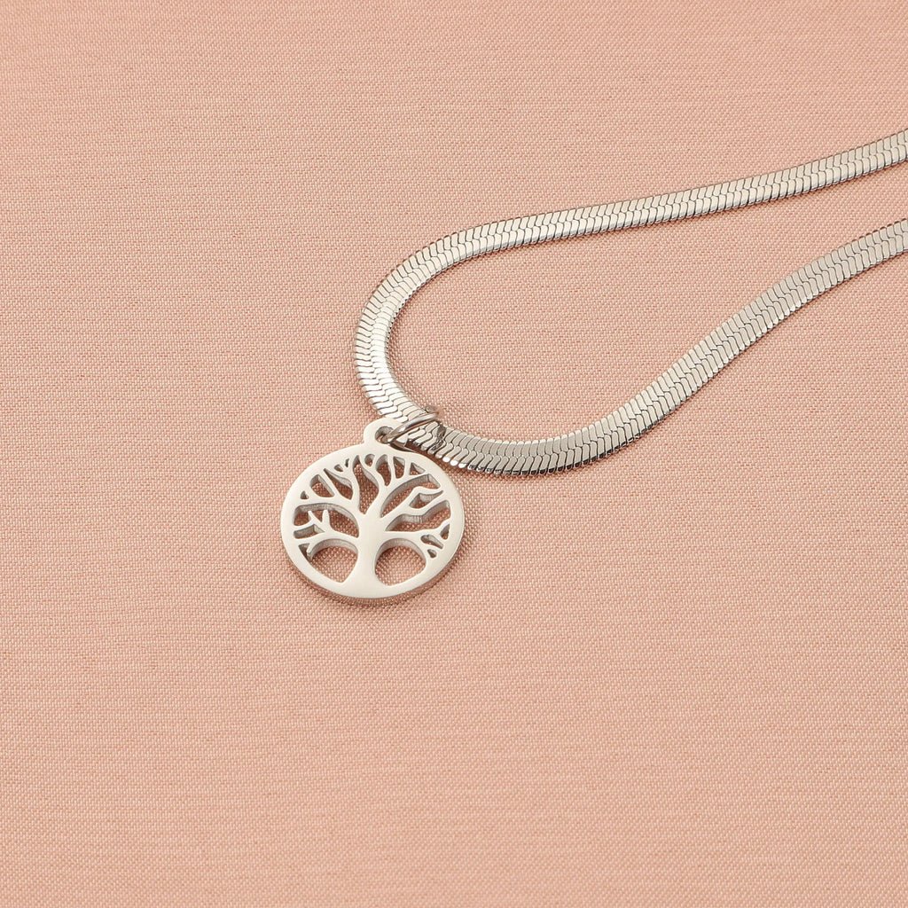 Stainless steel tree pendant necklace on a textured snake bone chain, shown in gold colour.