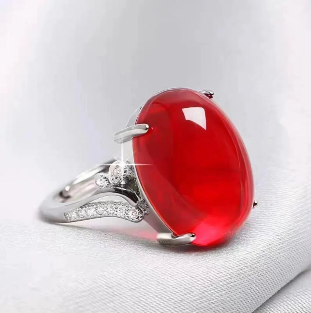 Geometric-style adjustable alloy ring in five colour options on a neutral background.