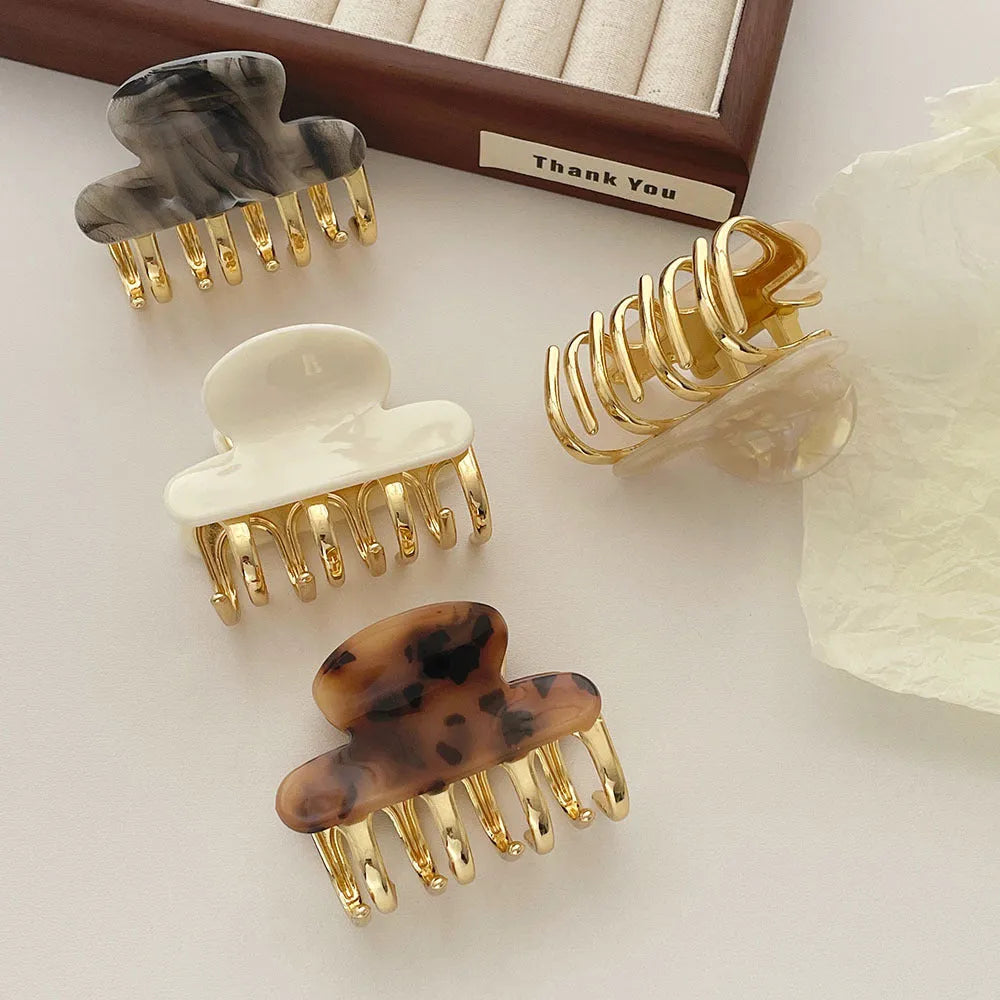 Women's retro acetate hair barrette with metal grip in leopard print colour option
