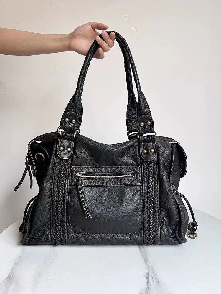 Women's brown retro PU messenger bag with woven accent and shoulder strap