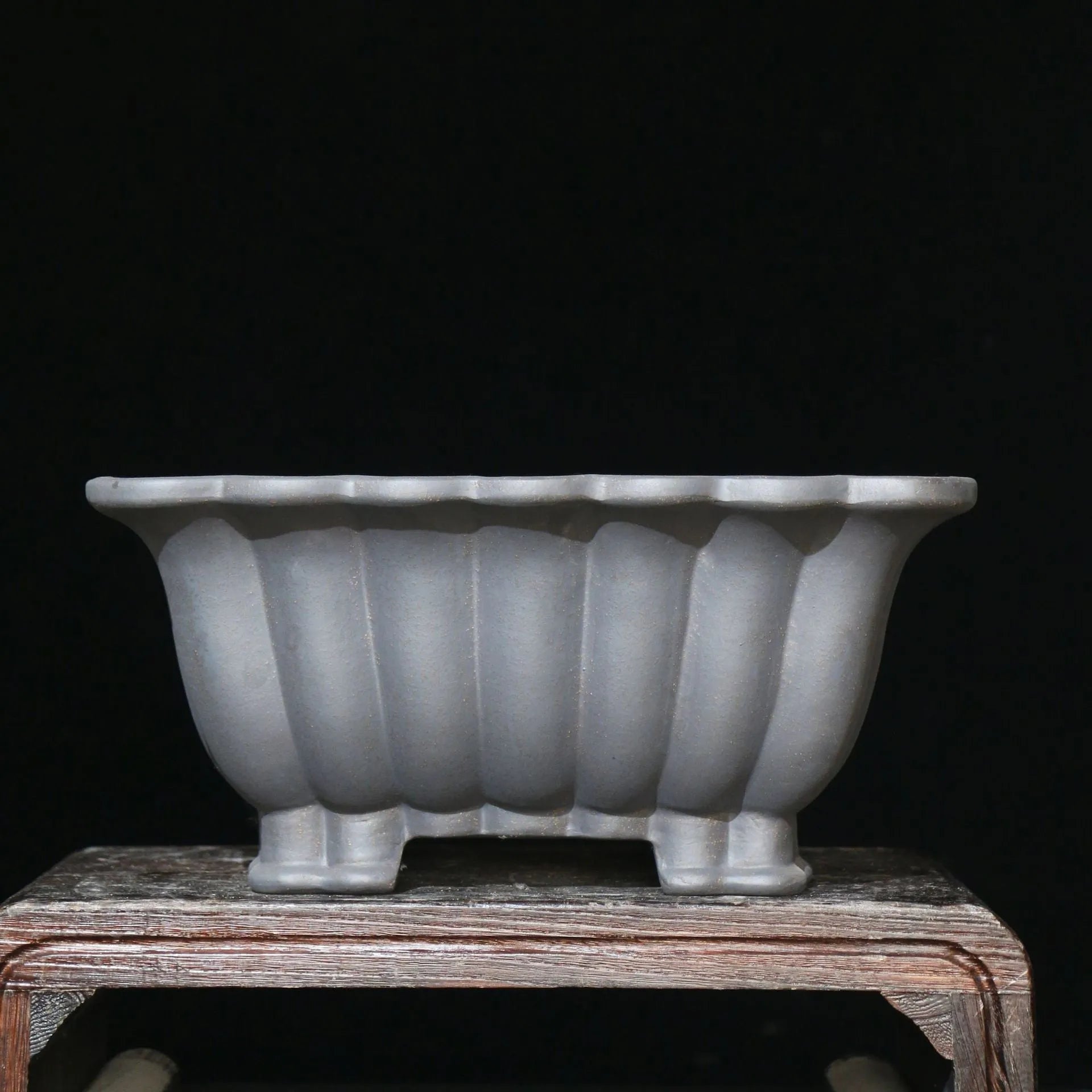 Square purple sand ceramic bonsai pot with classical styling on desktop