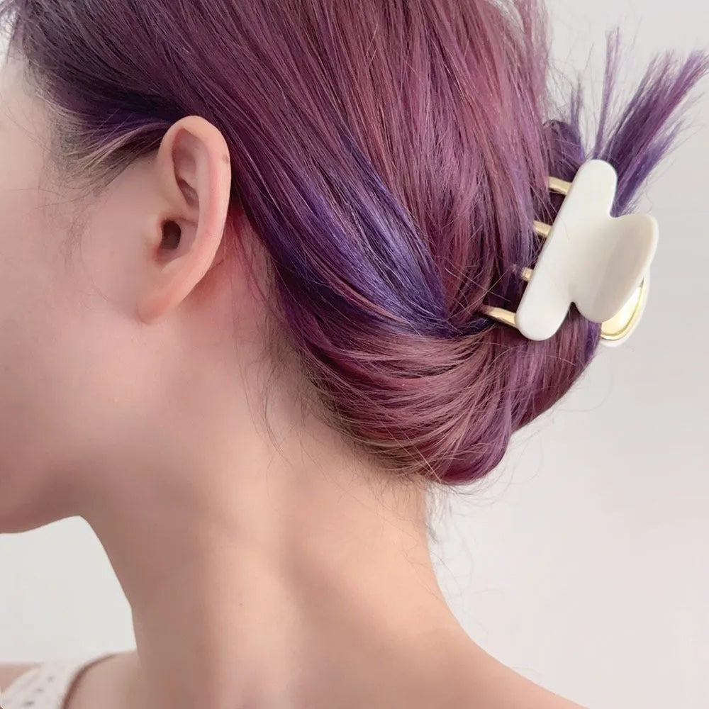 Women's retro acetate hair barrette with metal grip in leopard print colour option