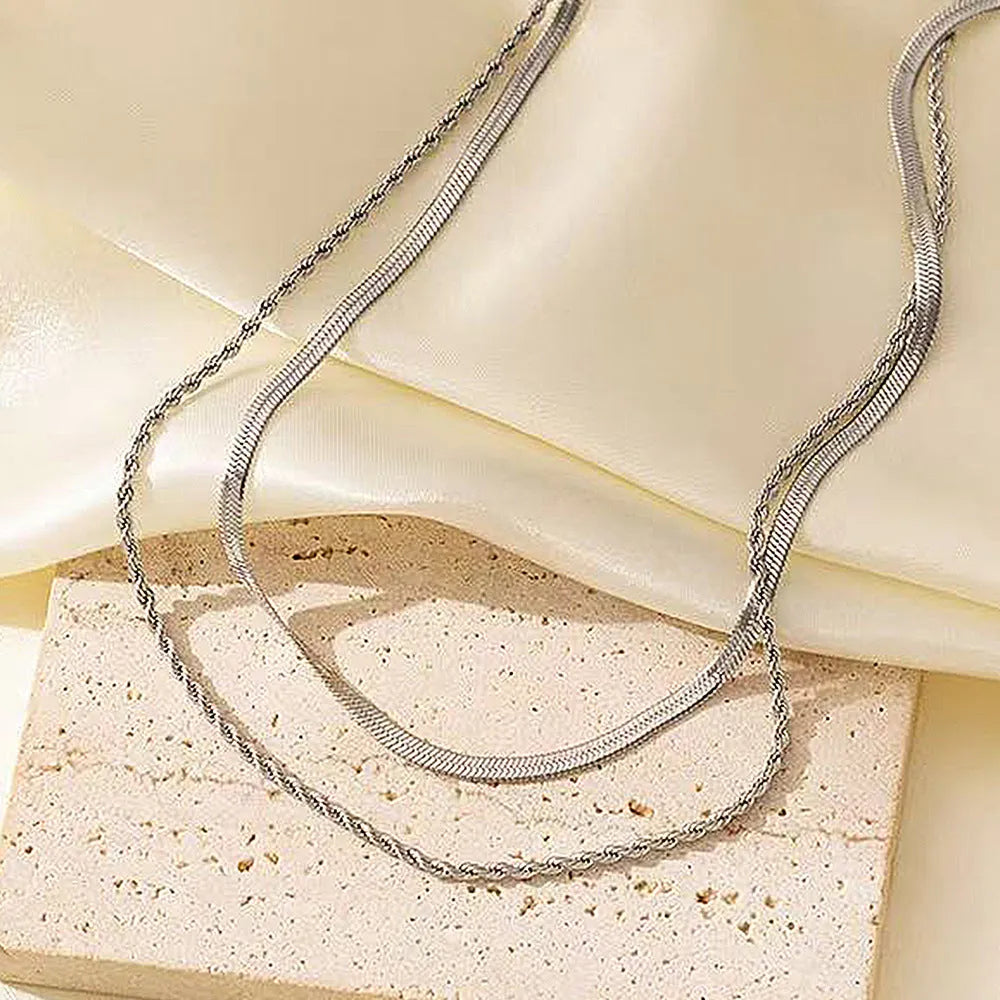 Women's retro double-layer twist necklace with geometric pendant on adjustable snake bone chain