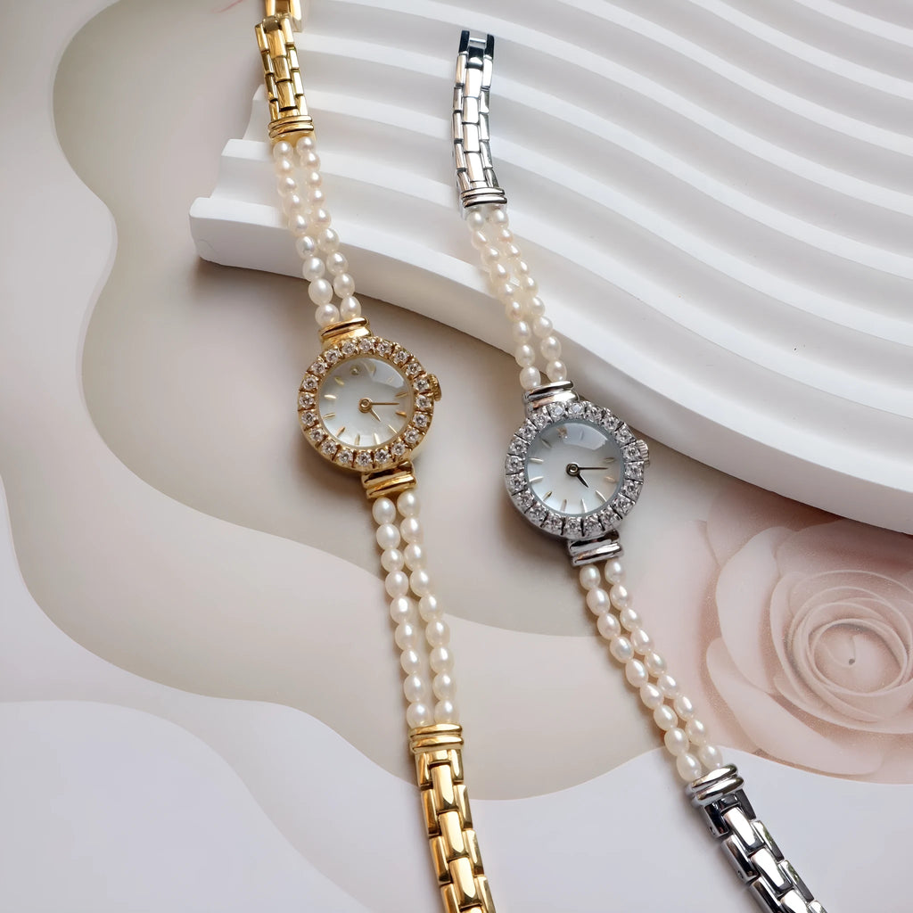 Women's light gold bracelet watch with freshwater pearl dial and stainless steel strap