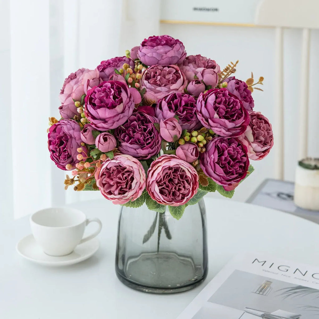 Artificial silk peony bouquet in a choice of champagne, pink, purple, sand red, or white colours.