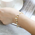 Women's imitation pearl beaded bracelet with glass coloured beads in six pearl lifting colour options