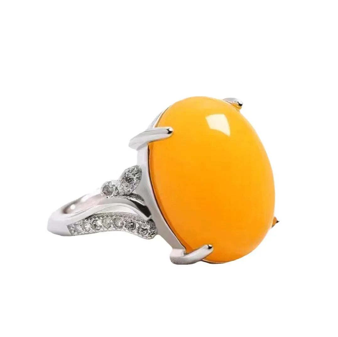 Geometric-style adjustable alloy ring in five colour options on a neutral background.