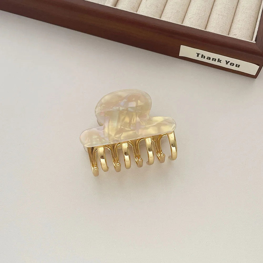 Women's retro acetate hair barrette with metal grip in leopard print colour option