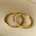 40mm diameter metal circle earrings in electroplated copper with gold and silver colour options