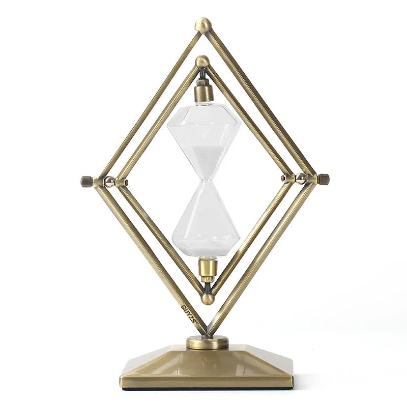 Glass sand clock with metal base showing coloured sand, in bronze or silver finish options.
