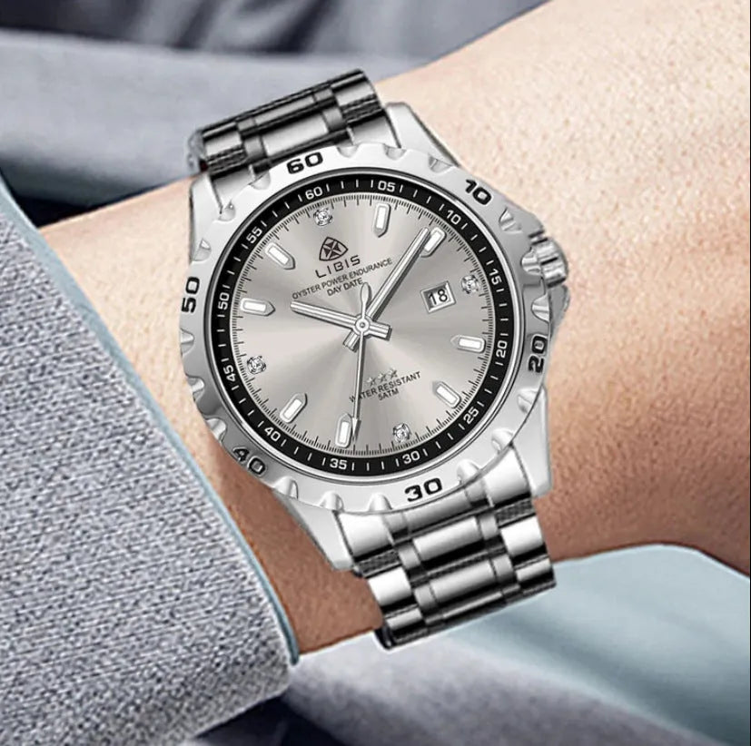Men's silver quartz watch with luminous display and stainless steel strap