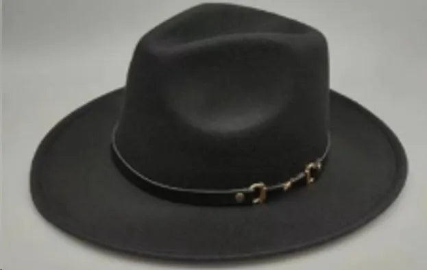 Brown leather velvet curved edge Western cowboy hat with a conical crown.