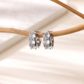 Women's silver-tone U-shaped clip earrings with inlaid clear zircon stones on the front.