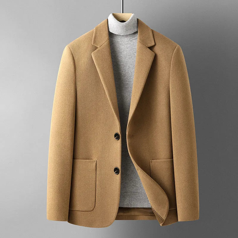 Men's slim fit wool suit jacket in grey, shown on a hanger, suitable for autumn and winter.