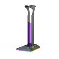 RGB colour changing headphone display stand with dual USB ports on a desk