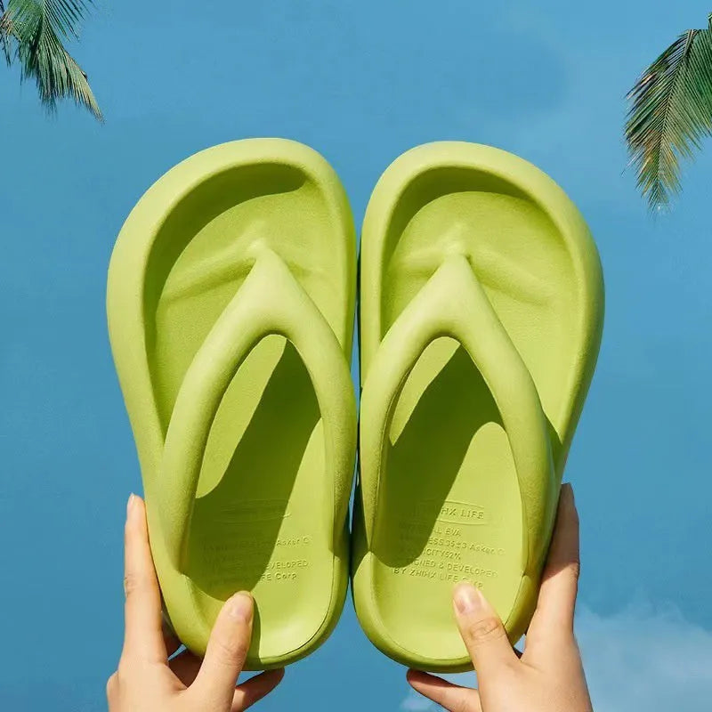 Solid colour EVA thong sandals with thick sole and a bow on the strap.