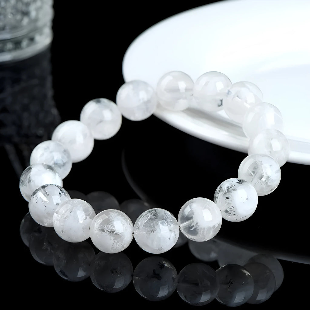 Women's crystal bracelet with natural blizzard snowflake round beads and ruyi xiangyun design elements