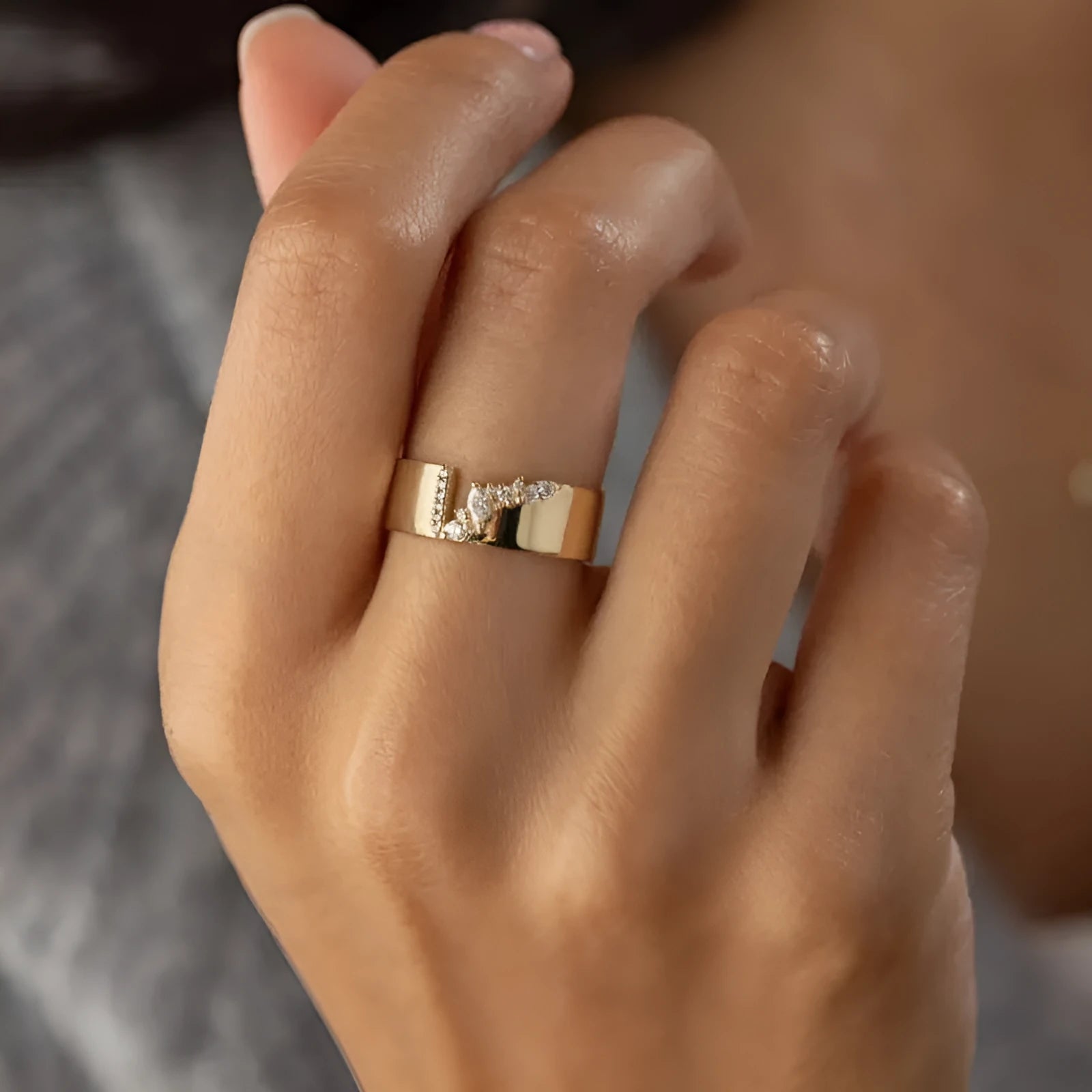 Gold electroplated zircon ring for women shown in size 8.