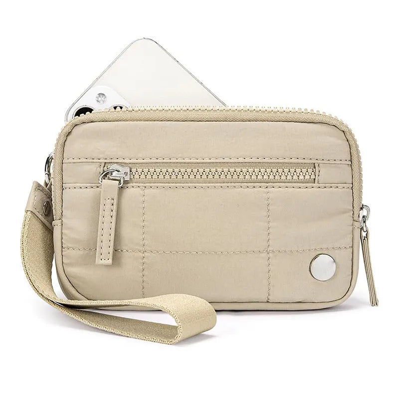 Waterproof quilted nylon handbag with transparent deck section in solid colour with urban simplicity styling