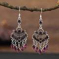 Purple retro drop earrings with dangling crystal fringe elements and ethnic style detailing