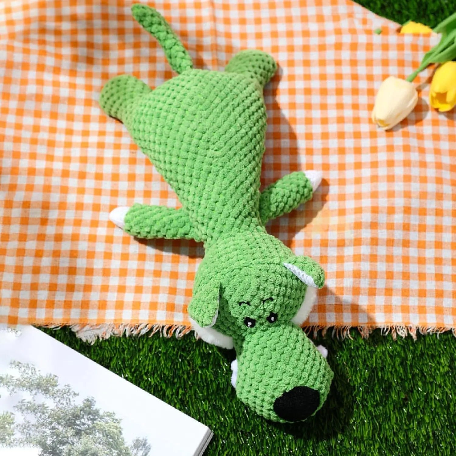 Plush dog toy with corn kernel texture in green grey or yellow featuring a built-in sound device for teeth grinding