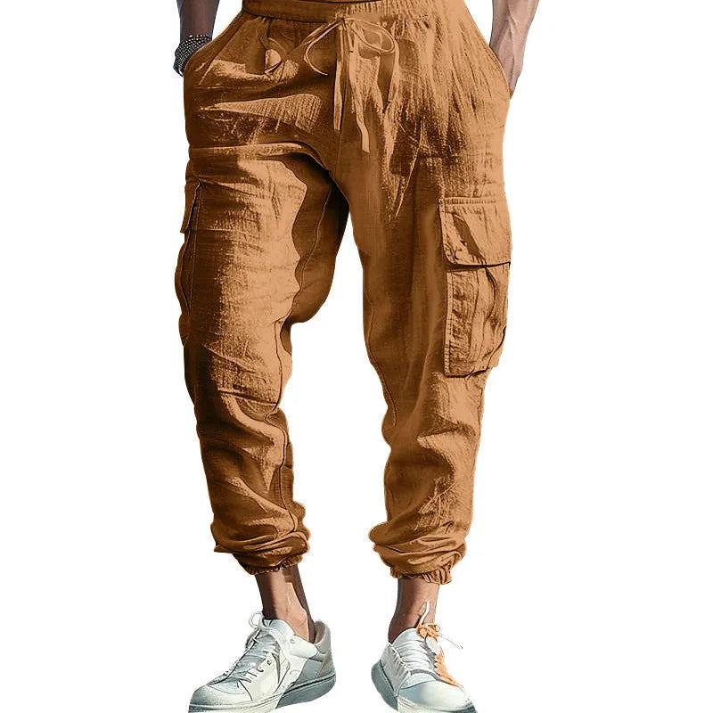 Men's linen casual trousers with drawstring waist and ankle-tied cuffs in solid colours