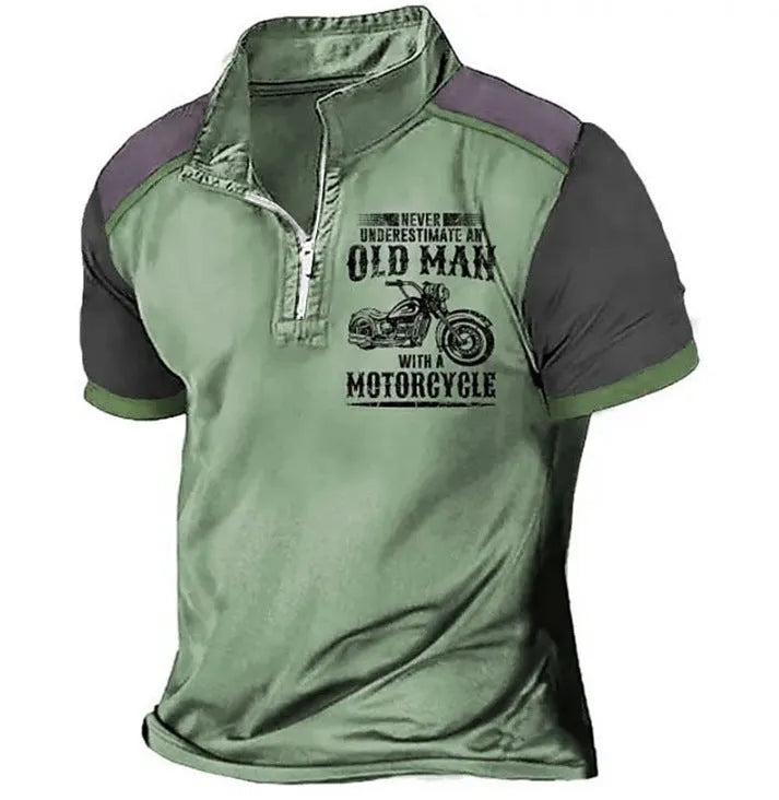Man wearing a casual lapel polo shirt with a digital print design and zipper detail.