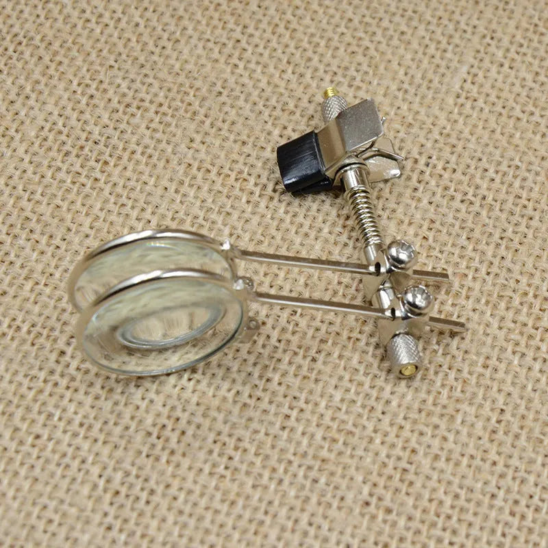 Auxiliary reading glasses double clip with a metal bracket and glass lens.