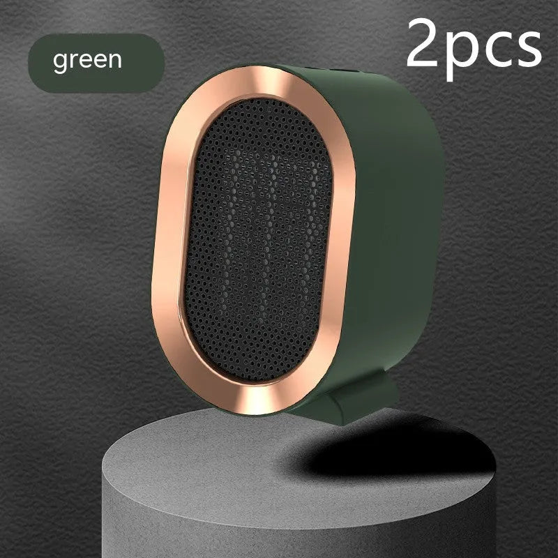 Desktop electric ceramic fan heater in black finish with mechanical controls