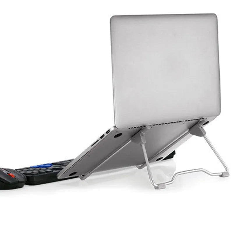 Grey aluminium alloy mobile phone and laptop stand with adjustable height and angle mechanism.