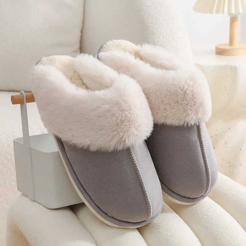Women's winter plush slippers with round toe design in brown colour showing stitching detail