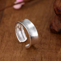 Sterling silver geometric open ring with frosted finish and adjustable opening