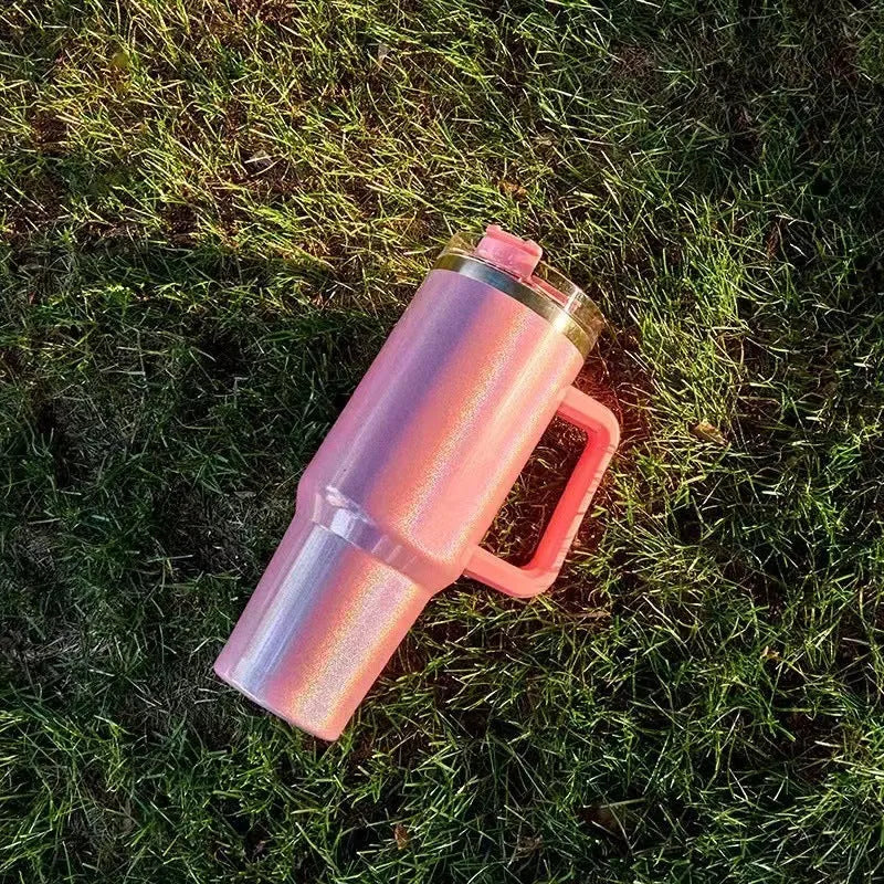 Large stainless steel vacuum insulated cup in a gradient colour option showing its height and simple style.