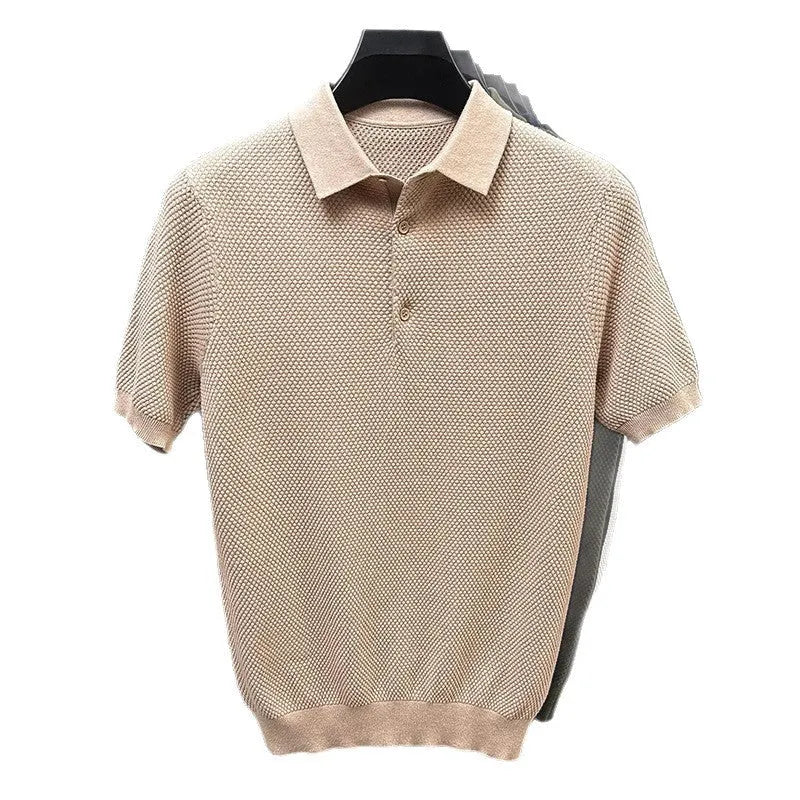 Loose fitting short sleeve cotton sweater in a neutral colour, showing pullover style and casual fit.
