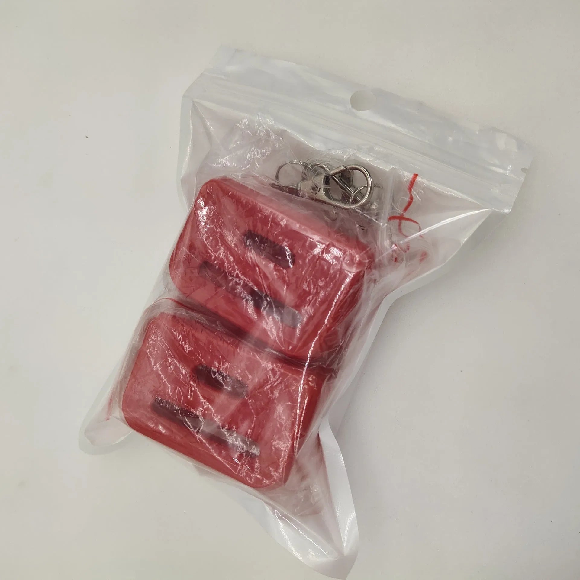Black and red plastic seat belt buckle clamp holders for automotive use