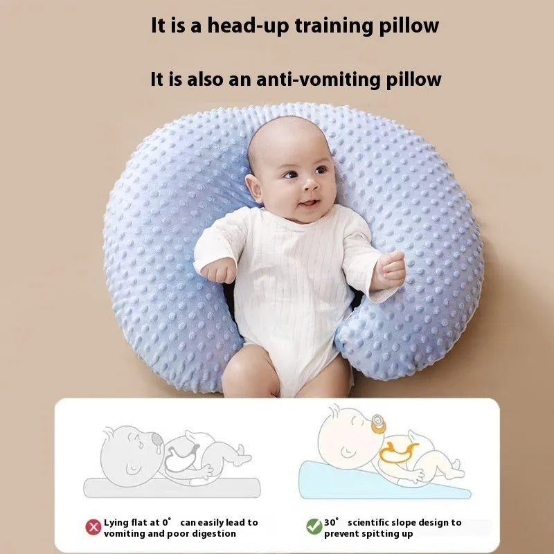 Grey nursing pillow with removable pillowcase for breastfeeding support and milk spill prevention