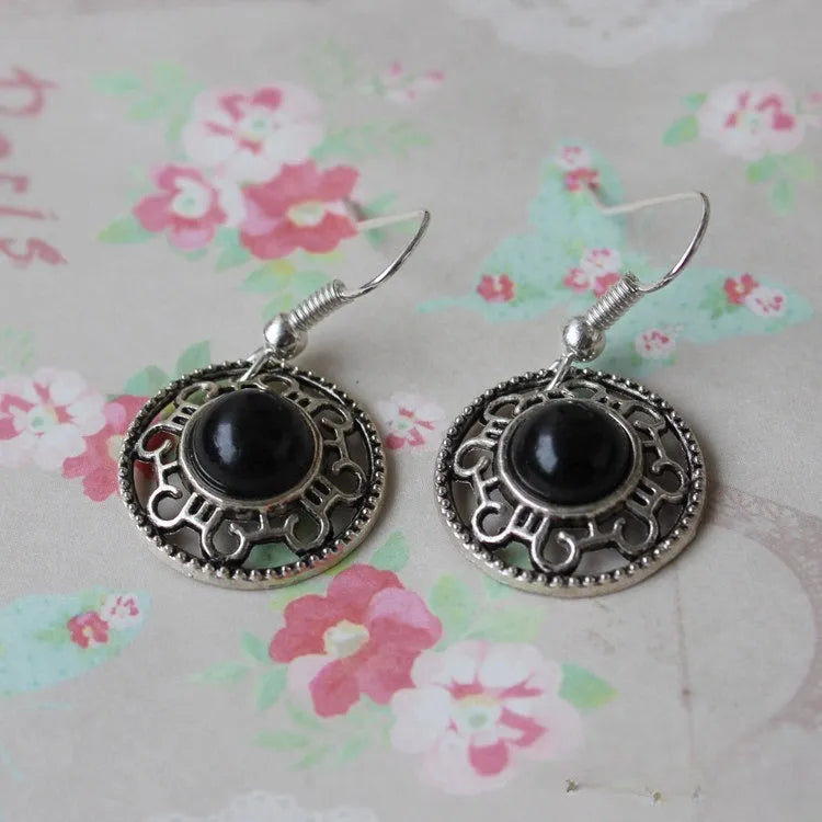 Miao silver retro turquoise flower disk earrings with geometric shape and ethnic patterns
