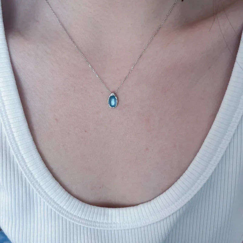 Navy blue water drop necklace pendant on adjustable cross chain, electroplated copper geometric jewellery